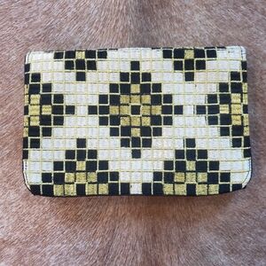 Embroidered clutch